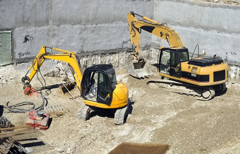 Excavators parked at a construction site