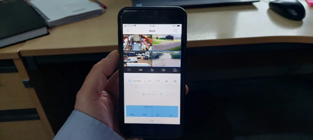 Smartphone displaying a remote security camera viewing interface