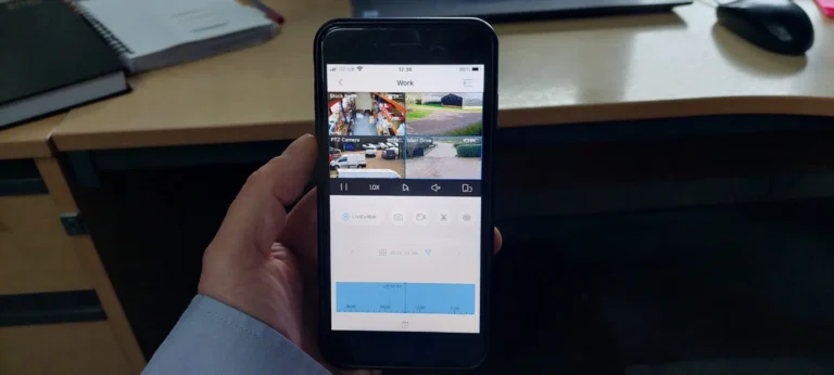 Smartphone displaying a remote security camera viewing interface